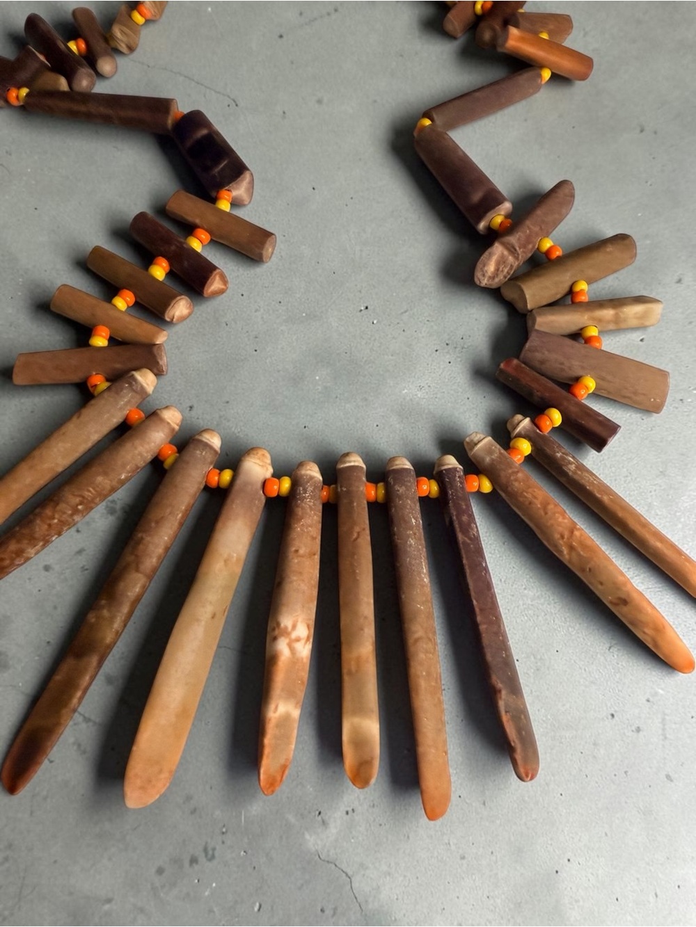 Earth-Tone Wooden Spike Necklace with Orange Bead Accents